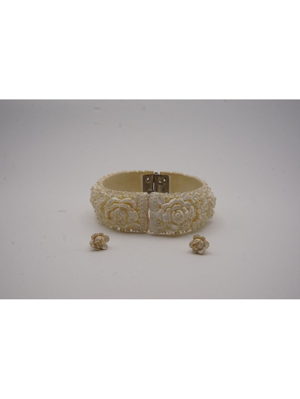 Ivory floral cuff bracelet with matching earrings
